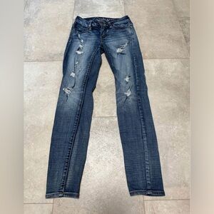 American Eagle “super stretch” distressed jeggings size 00